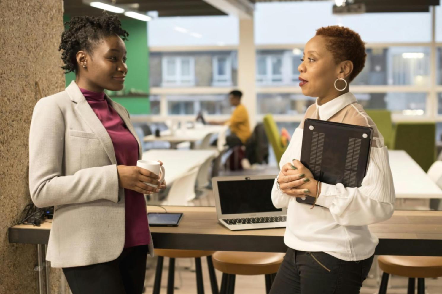 Business professionals collaborating on financial planning in modern office environment